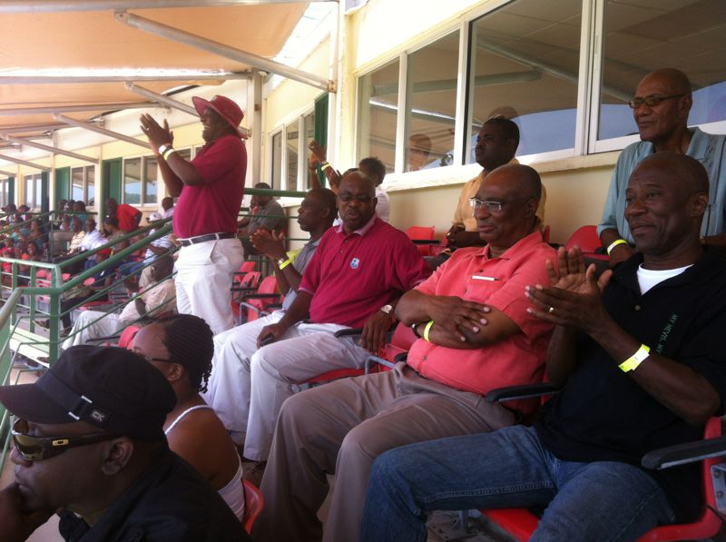 (2nd Row, L-R) Minister of Communications and Works, Hon. Carlisle Powell, Premier of Nevis, Hon. Joseph Parry and Cabinet Secretary in the Nevis Island Administration, Mr. Ashley Farrell watching cricket at Warner Stadium in St.Kitts